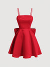 Chic Elegance: Solid Color Spaghetti Strap Dress with Back Bowknot Detail