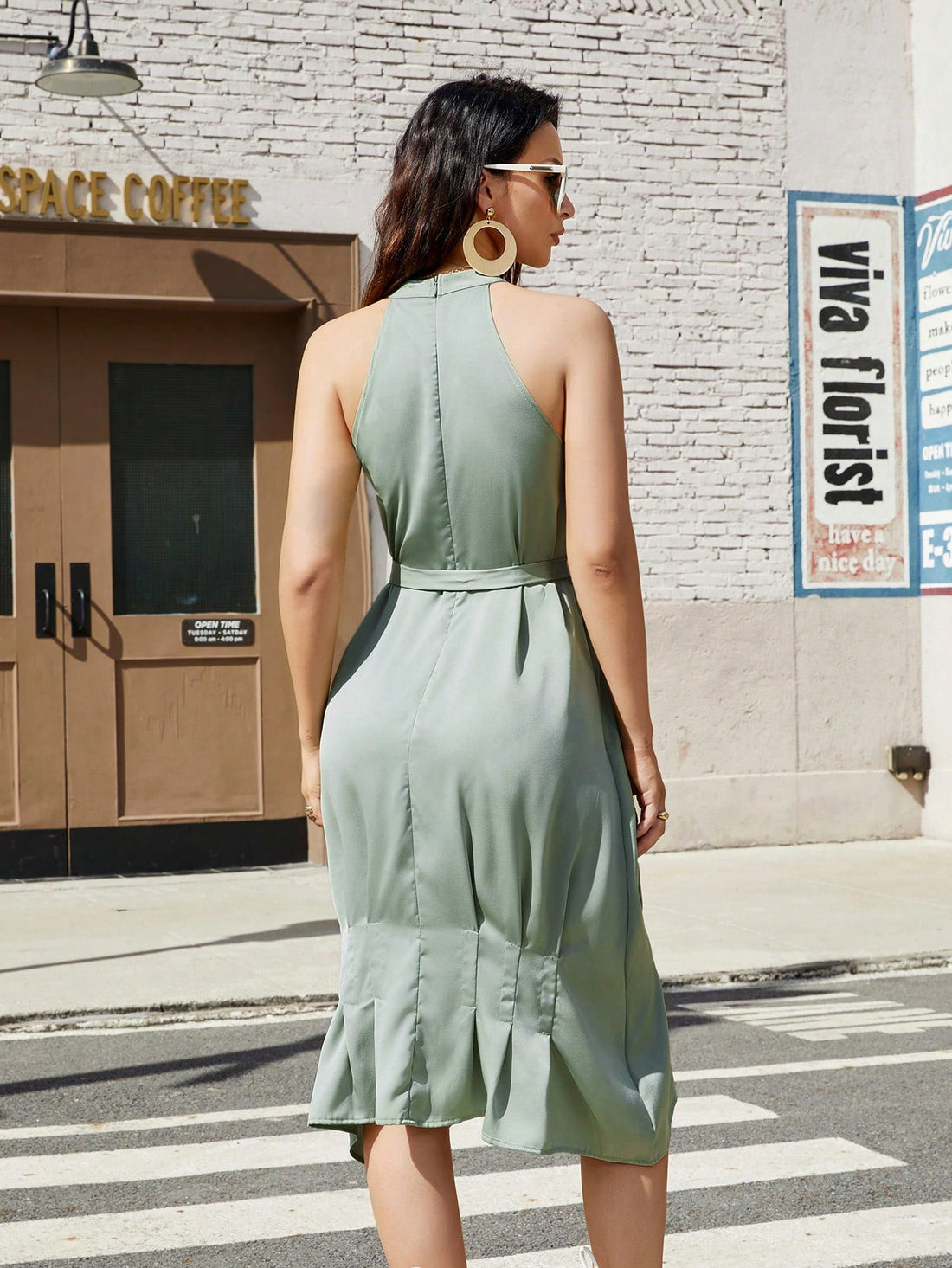 Elevate your style game with our Chic Sleeveless Mint Green Dress! Whether it's a casual day out or a special occasion, this dress has got you covered. With its trendy design and flattering fit, you'll feel confident and comfortable all day long. So go ahead, make a statement with this perfect dress!