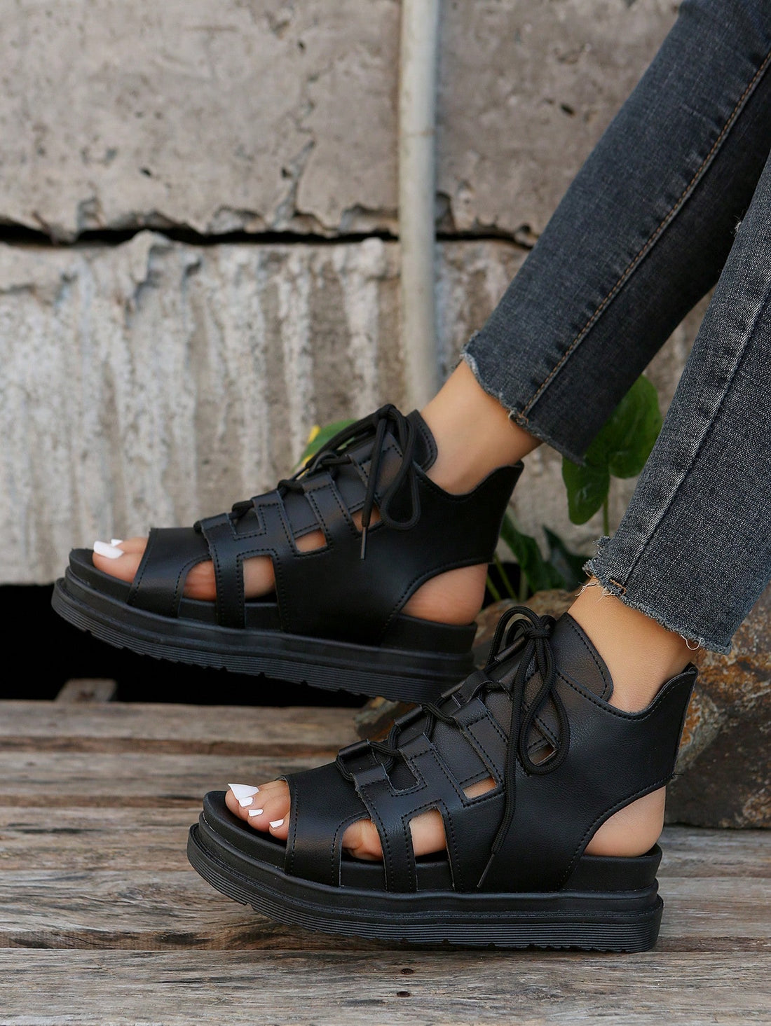 Step up your summer style with our Chic Roman Style Platform Sandals. These sandals feature a sleek and stylish design that will elevate any summer outfit. With a comfortable platform and trendy Roman-inspired straps, these sandals are the perfect addition to your wardrobe. Whether you're heading to the beach or a night out, these sandals will take your style to the next level.