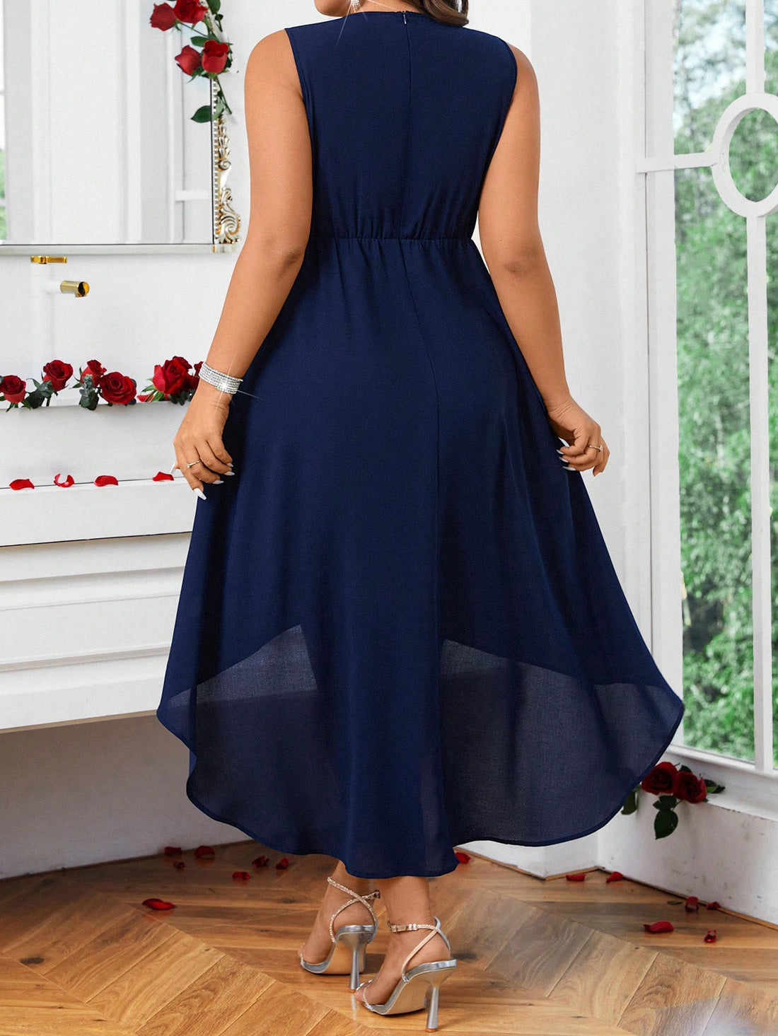 Step into your spotlight with this Elegant Plus Size Sleeveless High-Low Wedding Dress. The playful silhouette flares effortlessly, showing just the right amount of leg up front, while the contrast lace detail adds a touch of sultry sophistication. Perfect for dancing the night away or stealing every glance, this dress combines comfort with a flirty twist to make your special day truly unforgettable.