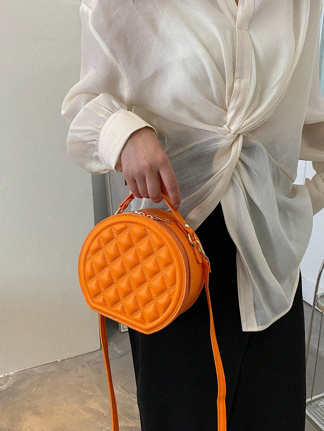 Elevate your style with our Quilted Chic: Mini Fashion Crossbody Bag. Crafted for fashion-forward women, this bag is lightweight and convenient for everyday use. The chic quilted design adds a touch of sophistication to any outfit. Stay on trend and organized with this must-have accessory.