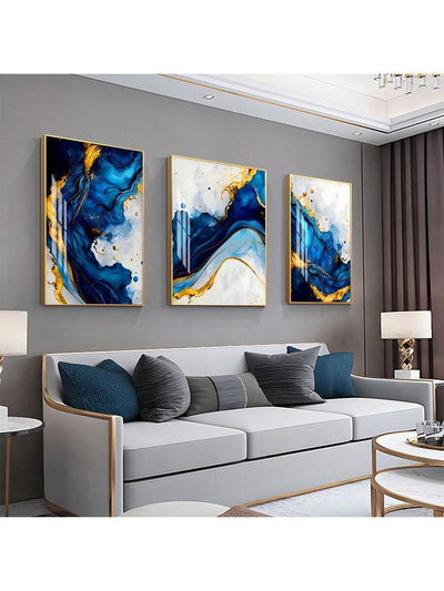 Enhance your home decor with our 3-piece luxury canvas prints featuring a stunning blue and golden abstract design. Elevate your space with a touch of modern minimalism. Expertly crafted with high-quality materials, these prints will bring life and style to any room. Order now and transform your home.
