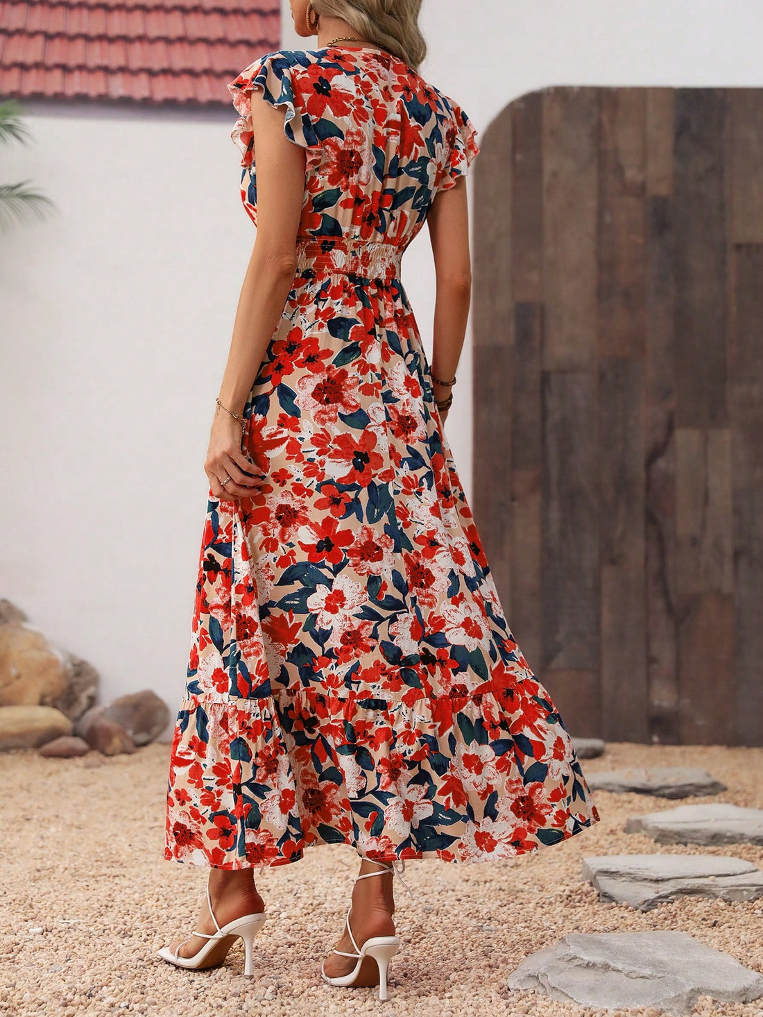 Unleash your inner beach goddess with our Effortless Elegance: Floral Maxi Dress. Designed for stunning beach getaways, this dress effortlessly combines elegance and comfort. The beautiful floral print will make you stand out while the maxi length keeps you stylish and comfortable. Perfect for your next vacation! (Insert heart-eye emoji)