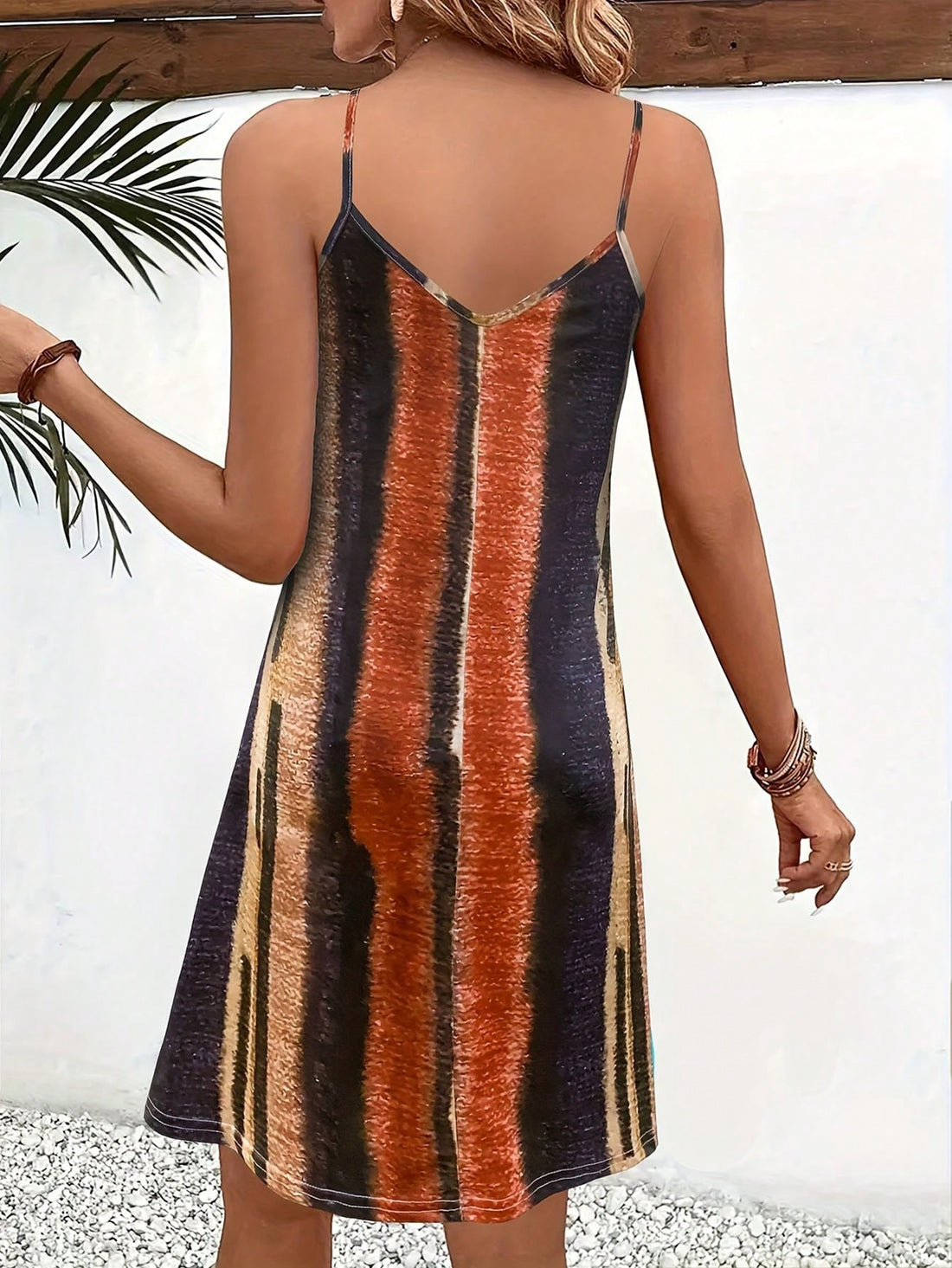 Elevate your wardrobe with our Chic and Stylish printed spaghetti strap dress. Perfect for any occasion, this dress adds a touch of elegance and style to your look. With its feminine silhouette and trendy print, you'll be sure to turn heads wherever you go. Don't sacrifice fashion for comfort - this dress offers both in one!