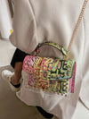 Edgy Graffiti Rivet Handbag: Trendy Urban Chic Accessory