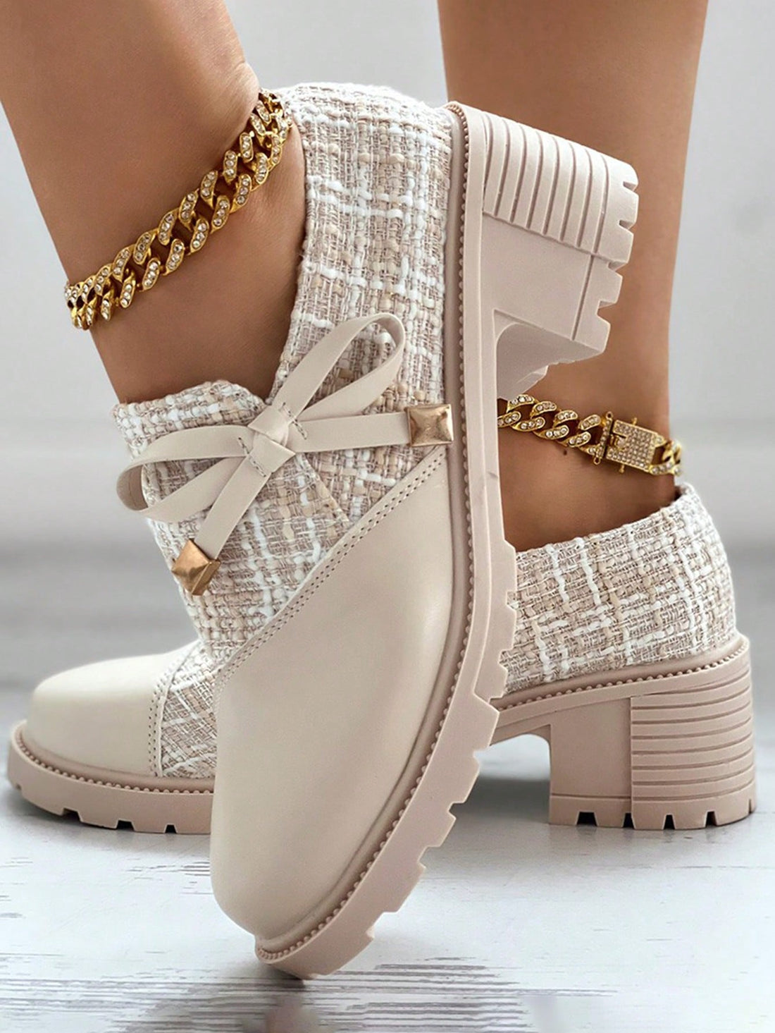 Upgrade your formal shoe game with our Chic Retro Plaid Bowknot Heels. The stylish thick sole provides both comfort and sophistication for any occasion. Enhance your overall look with these fashionable heels that feature a trendy bowknot design. Elevate your style with our must-have shoes for women.