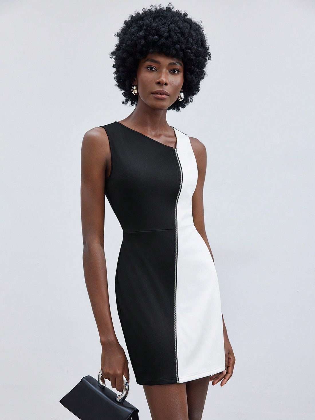 Turn heads effortlessly with this Stylish Asymmetrical V-Neck Zipper Dress! Its slim fit hugs your curves while the eye-catching color contrast adds a fun twist. The unique asymmetrical design and zipper detail bring a playful edge to your wardrobe, perfect for days when you want to feel confident and chic. Whether dressed up or down, this dress makes every outing a stylish adventure.