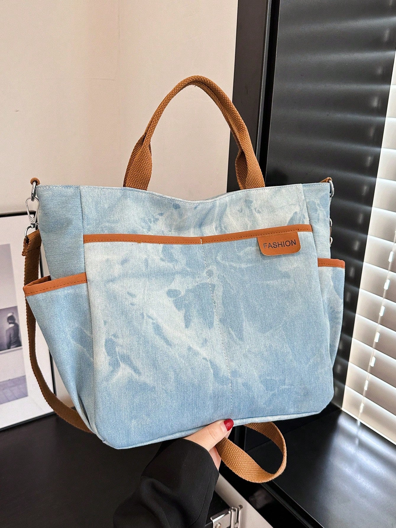 This Chic Canvas Tote Bag is designed for stylish middle-aged women. Made from durable canvas material, it offers both fashion and function. With a spacious interior and multiple pockets, it provides convenience and organization for everyday use. Elevate your style with this chic and practical tote bag.