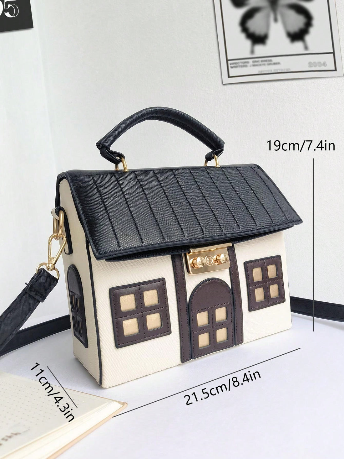 This Whimsical House Handheld Shoulder Bag is the perfect accessory for any fashion-forward individual. Its playful design features a charming pink and white color combination, adding a touch of whimsy to any outfit. With its convenient handheld and shoulder strap options, this bag offers both style and functionality. Add a touch of whimsy to your wardrobe with this one-of-a-kind bag.