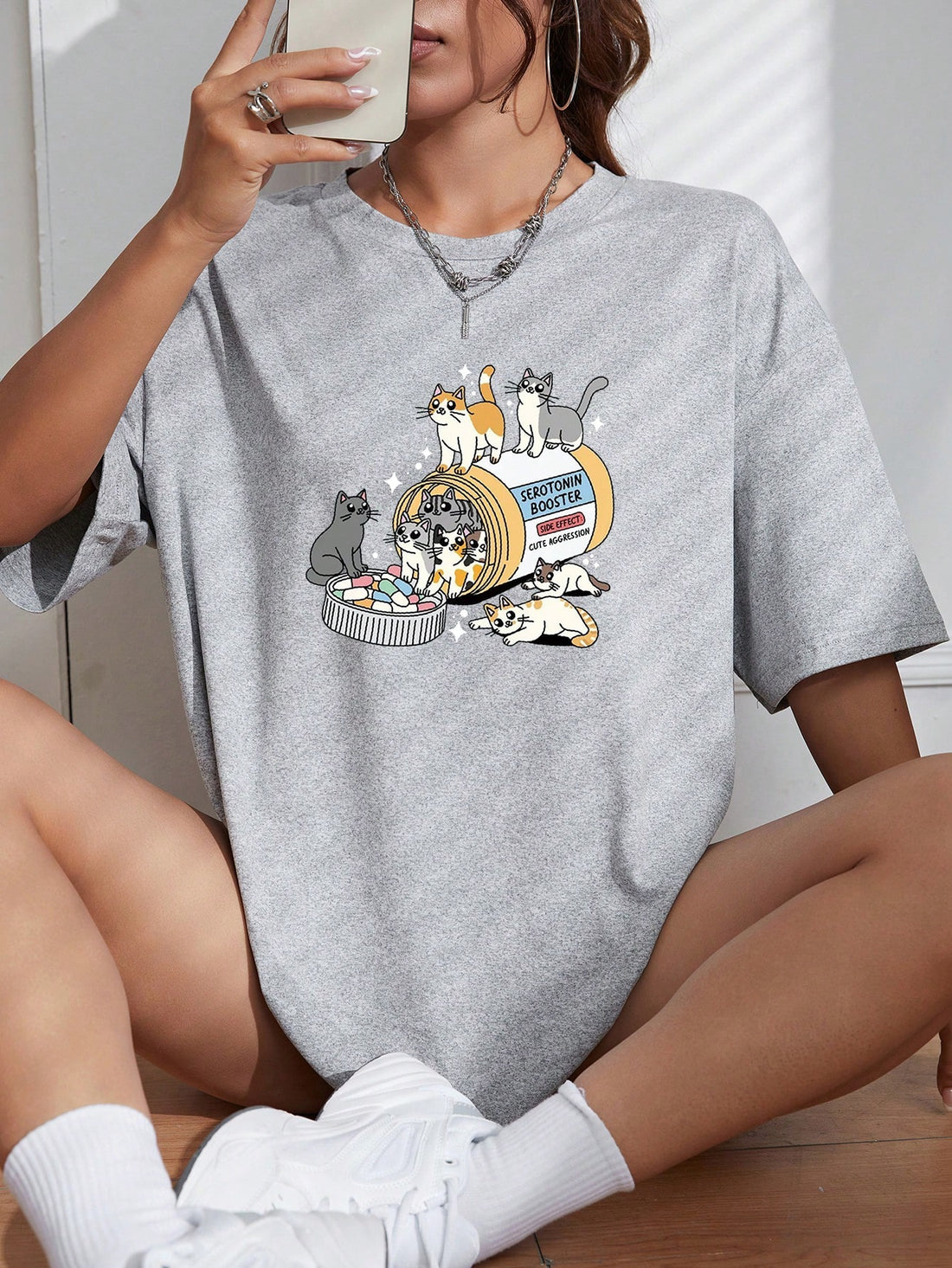 Introducing Playful Vibes, the perfect t-shirt for a cute and playful look. Featuring a unique cartoon print and a relaxed drop shoulder design, this shirt is both fun and comfortable. Made with high-quality materials, it's perfect for any casual occasion.