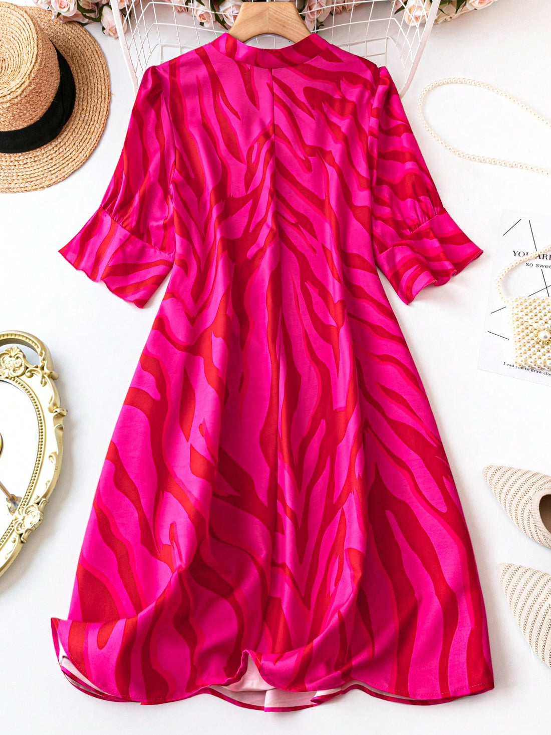Unleash your wild side in our Women's Zebra Print Notch V-Neck Plus Size Dress! Stand out in style with the bold zebra print and flattering v-neckline. Perfect for any occasion, this dress is a must-have addition to your wardrobe. Embrace your curves and let the fun begin!