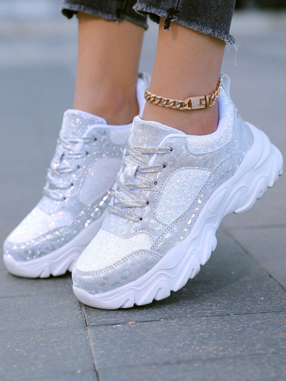 Add a touch of sparkle to your style with our Glitter Lace-Up Sports <a href="https://canaryhouze.com/collections/women-canvas-shoes?sort_by=created-descending" target="_blank" rel="noopener">Shoes</a> for Women. These shoes are designed for comfort and durability, featuring a lace-up design for a secure fit. The glitter details add a touch of glamour to your workout or casual look. Step out in style with our Sparkle in Style shoes.
