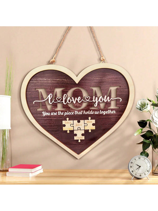 This Custom Engraved Wooden Puzzle Piece Sign is a beautiful and heartfelt tribute to any mom. Made of high-quality wood and expertly engraved with a personalized message, this sign will make a meaningful addition to any <a href="https://canaryhouze.com/collections/wooden-arts" target="_blank" rel="noopener">home decor</a>. Celebrate the love and bond between a mother and child with this unique and thoughtful gift.