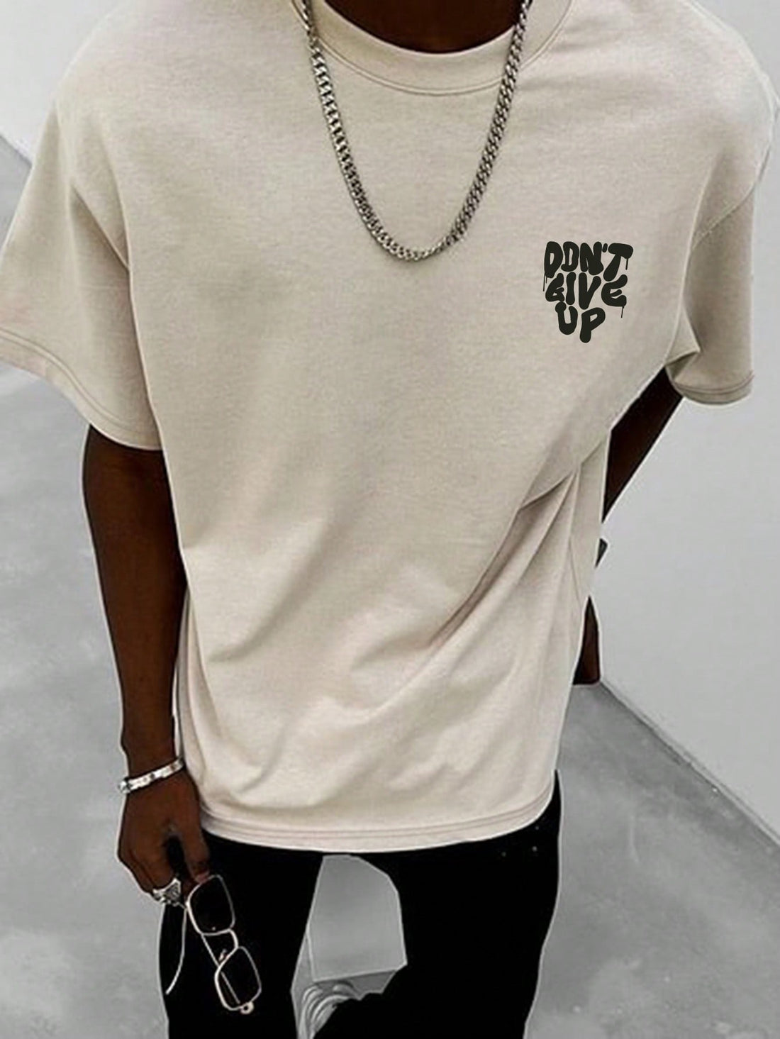 Elevate your style with our Bold and Stylish Men's Slogan Printed T-Shirt. Featuring a short sleeve design and eye-catching slogan print, this shirt offers both comfort and fashion in one package. Made with high-quality materials, this t-shirt is perfect for those looking to make a statement.