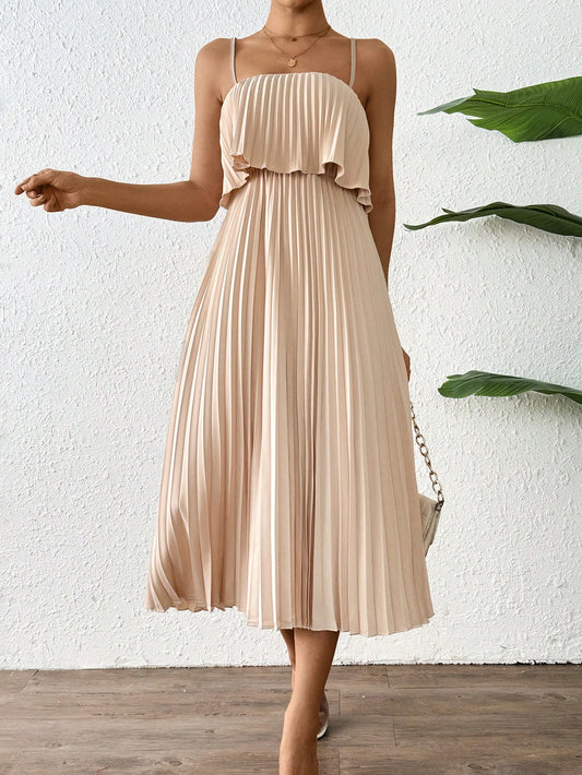 Elevate your style with the Frenchy Chic: Pleated Woven Cami Dress. This sophisticated dress boasts a stunning pleated design and a flattering cami silhouette. With a touch of effortless charm, this dress is perfect for any occasion. Bring a touch of chic French fashion to your wardrobe today.