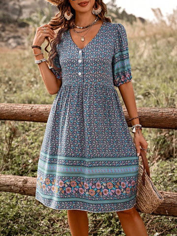 Bloom into summer with this charming floral printed dress that's equal parts fun and effortless. Featuring a classic button-front design, it's perfect for casual outings, weekend adventures, or lazy days that call for something comfortable yet put-together. The vibrant floral pattern brings instant personality to your wardrobe, while the relaxed silhouette keeps you cool and carefree. Dress it up with sandals and a hat, or keep it simple with sneakers—this versatile piece does it all. Your go-to summer stap