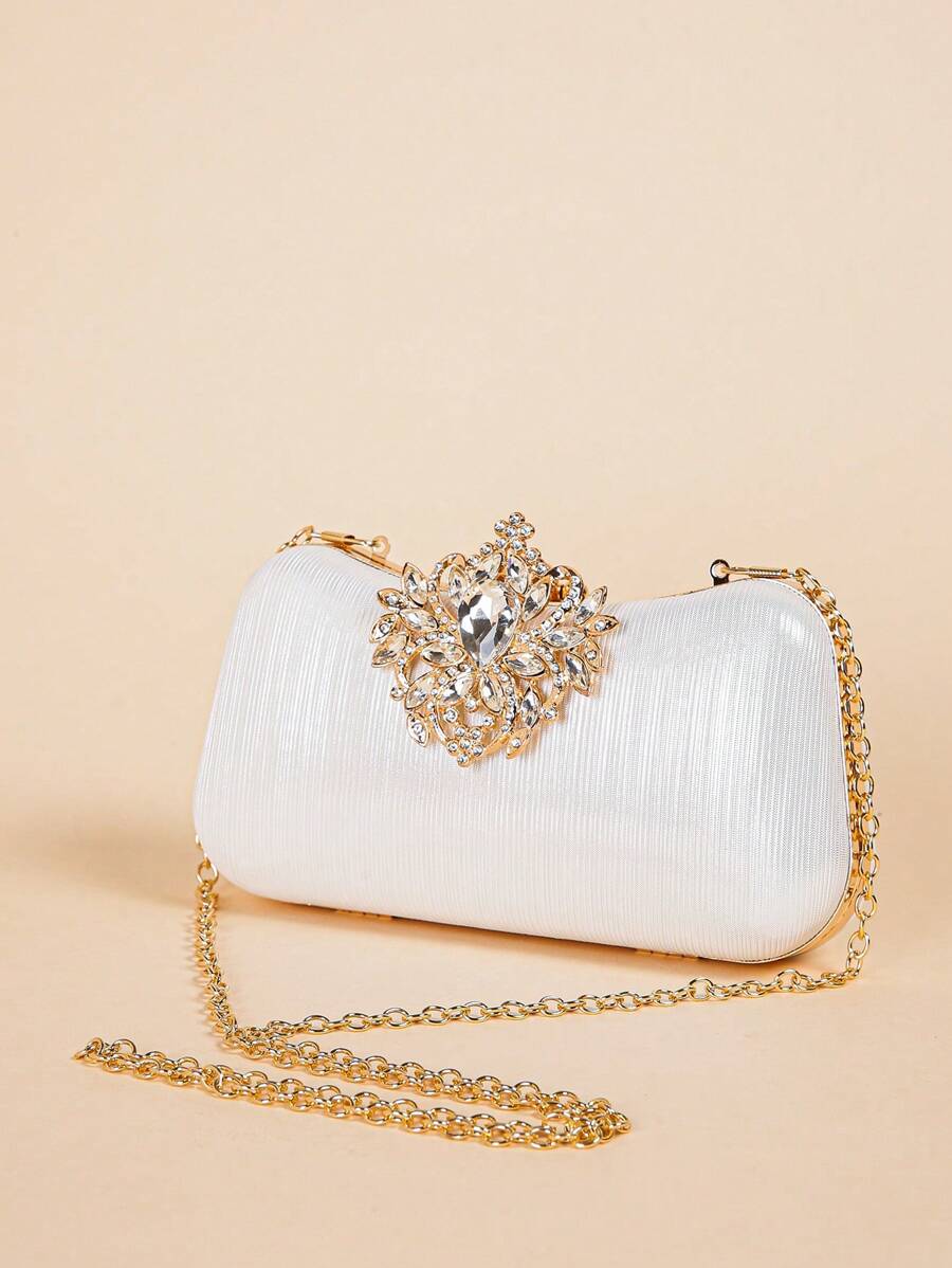 Add a touch of sparkle to your night with this Glamorous Rhinestone Evening Bag. Perfect for weddings, parties, and prom, this elegant clutch dazzles with shimmering rhinestones that catch every eye. Compact yet roomy enough for your essentials, it’s the playful accessory that turns heads and completes your look with effortless charm.