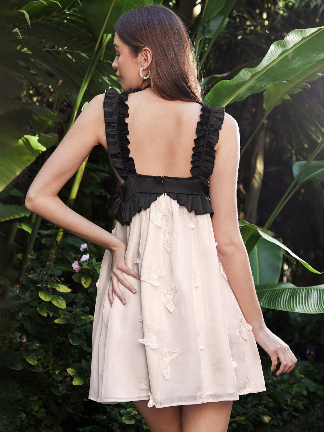 Effortlessly chic. This playful spaghetti strap dress features a unique color block design, perfect for adding a touch of romance to your wardrobe. Look stylish with little effort! (Hint: it's perfect for date night!)