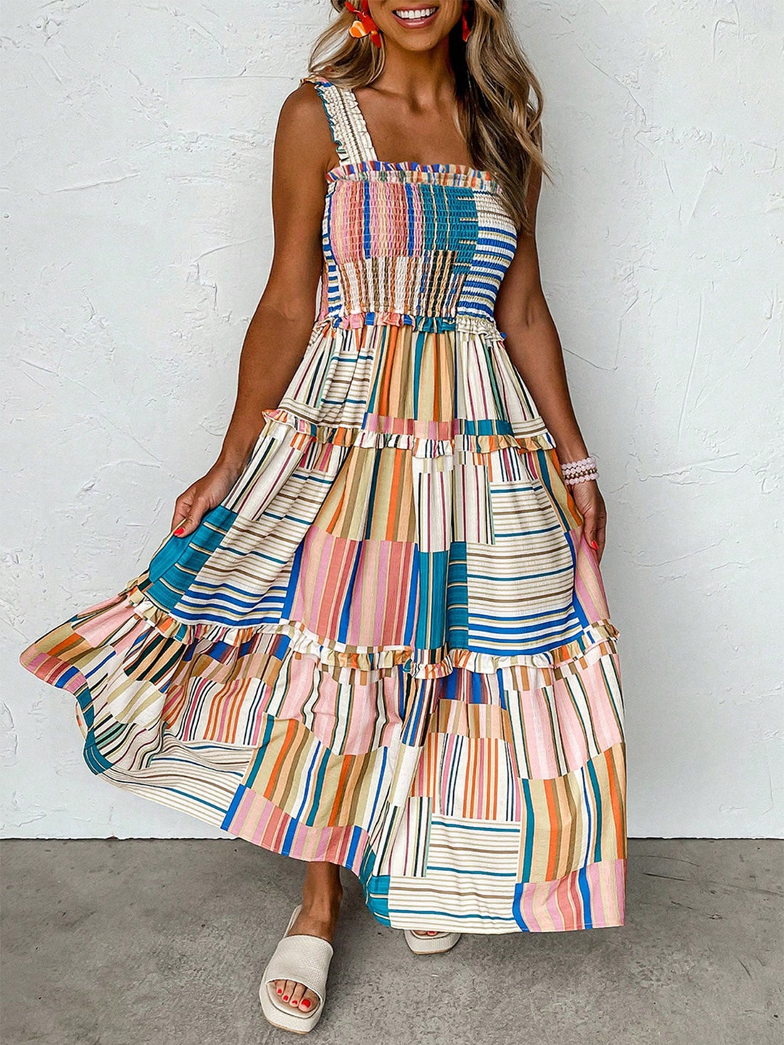 Elevate your summer wardrobe with our Lively Layers: Color-Blocked Swing Dress. With its playful design, this dress is perfect for any occasion. Its flowy silhouette and vibrant colors will make you stand out from the crowd. Stay stylish and comfortable all season long.