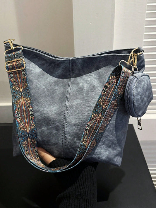 Travel in style and convenience with our Chic Denim Shoulder <a href="https://canaryhouze.com/collections/canvas-tote-bags?sort_by=created-descending" target="_blank" rel="noopener">Bag</a> Set! This lightweight sling is perfect for on-the-go adventures, with an additional small bag for storing essentials. Made with durable denim, this set is both fashionable and functional.