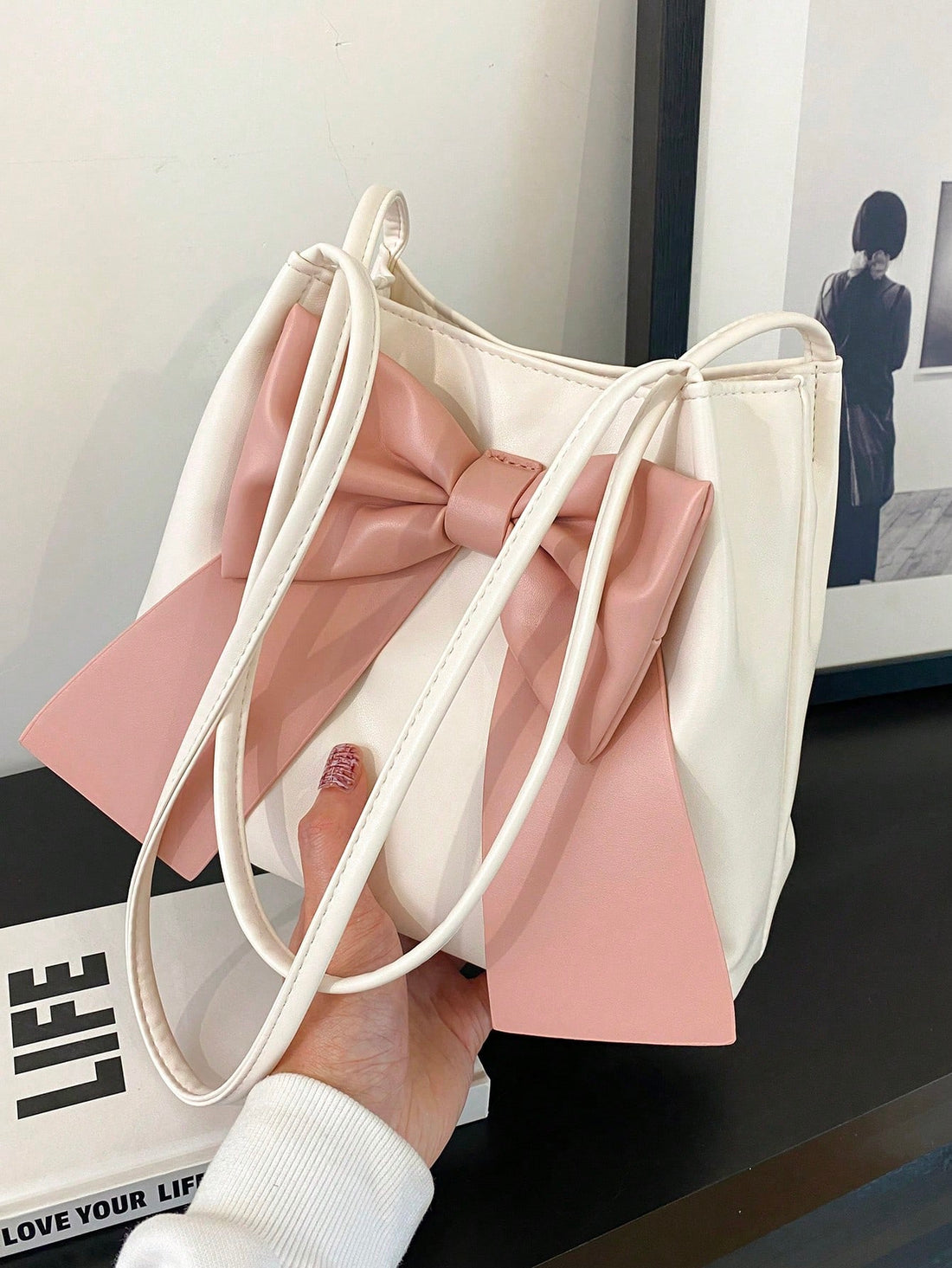 Introducing the Stylishly Chic Bucket Shoulder Bag, designed for the modern woman. With its large capacity, you'll have ample space for all your daily essentials. This bag combines fashion and functionality, making it the perfect choice for everyday use. Elevate your style with this chic and versatile shoulder bag.