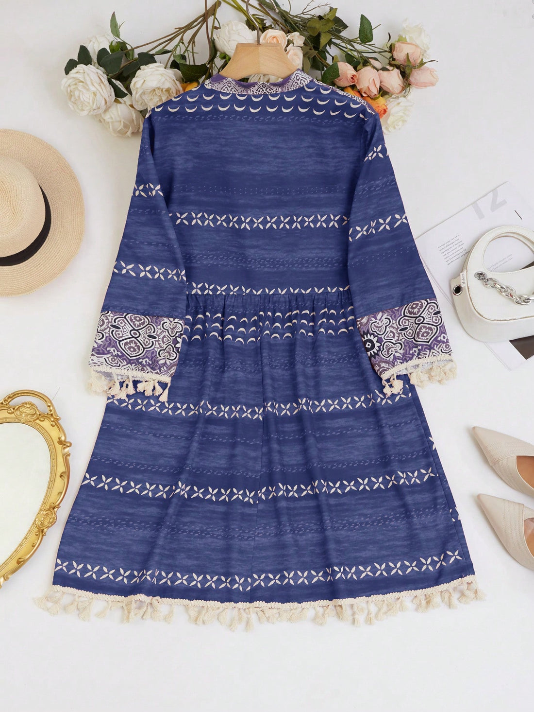 As a product expert, I recommend the Desert Dreamer Women's Tassel Decorated Western Style Dress. With elegant tassel decoration and a unique Western design, this dress will elevate any outfit. Made with high-quality materials, it is both stylish and comfortable. Perfect for any occasion, this dress is a must-have addition to any wardrobe.