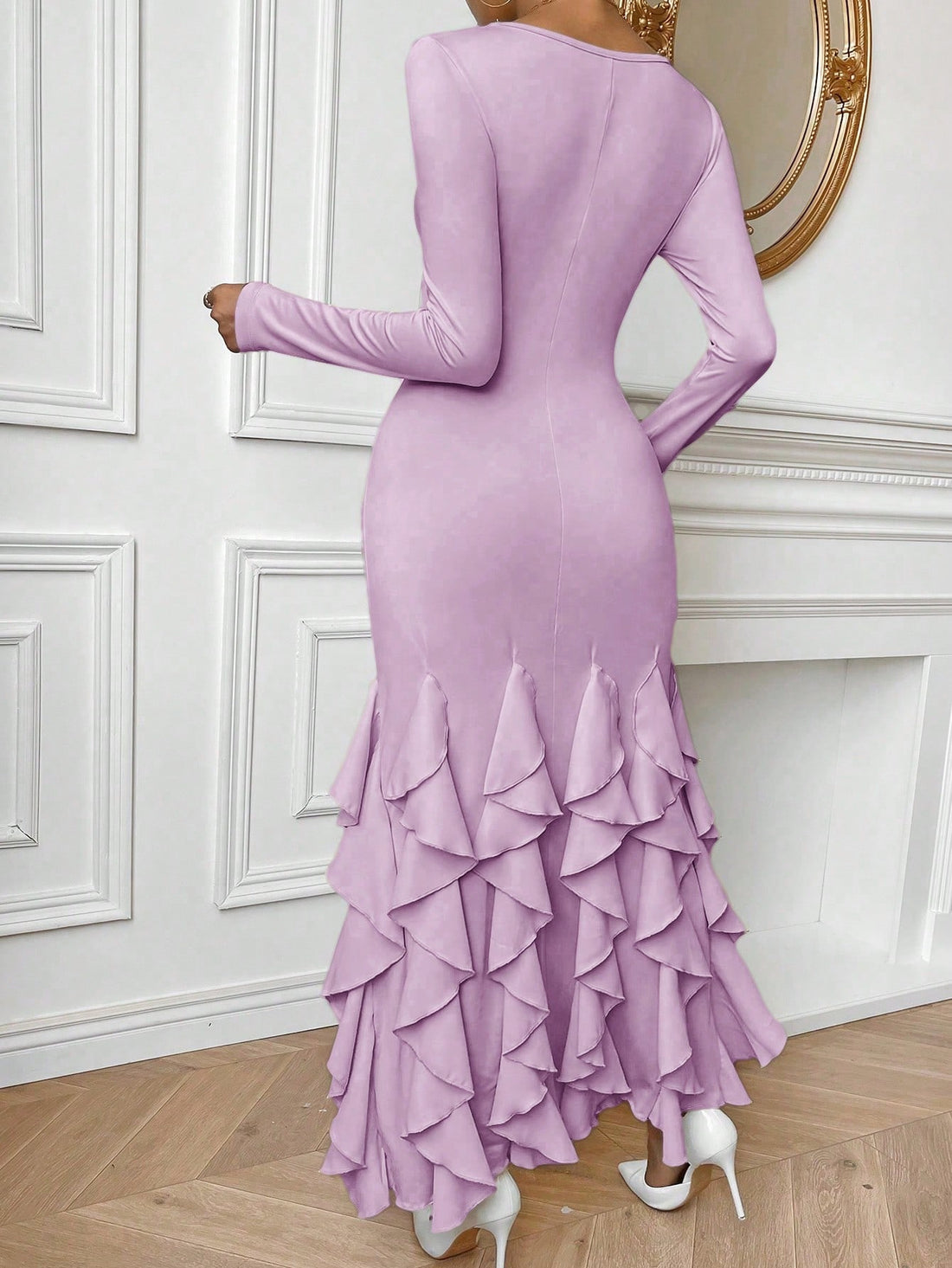 This elegant Fluttering Frill Trim Bodycon Dress features a feminine fish tail design and delicate frill trim details, providing a flattering fit for any occasion. Made with a solid color fabric, this dress exudes sophistication and style. Perfect for those looking for a chic and polished look.