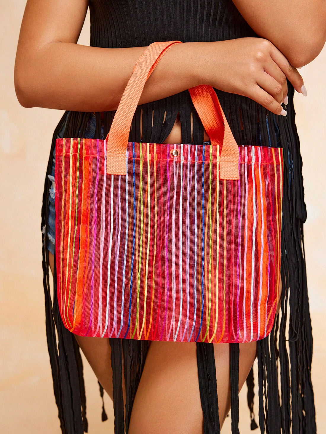 Introducing the Summer Vibes Mesh Tote Bag for Women! With its colorful design and lightweight mesh material, this bag is perfect for carrying all your essentials in style. Stay cool and trendy this summer with our must-have accessory.