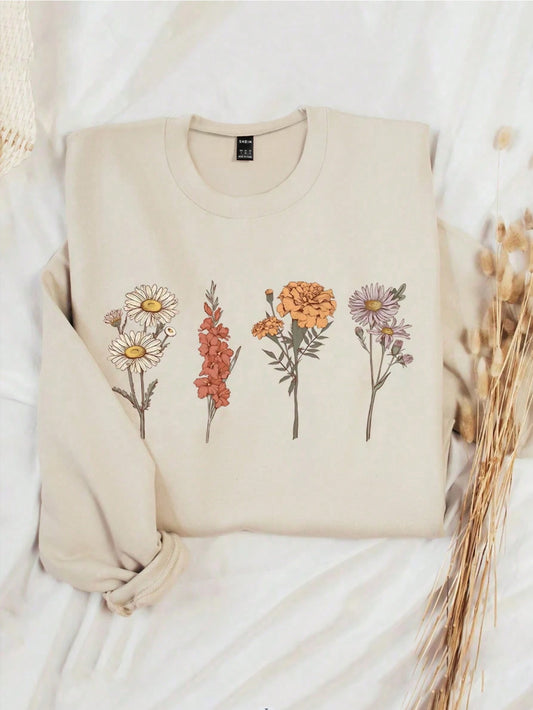 Experience comfort and style with our Blooming Beauty sweatshirt for women. The round neck design and floral print add a touch of elegance, while the soft fabric ensures a cozy fit. Perfect for any occasion, this sweatshirt is a must-have in your wardrobe.