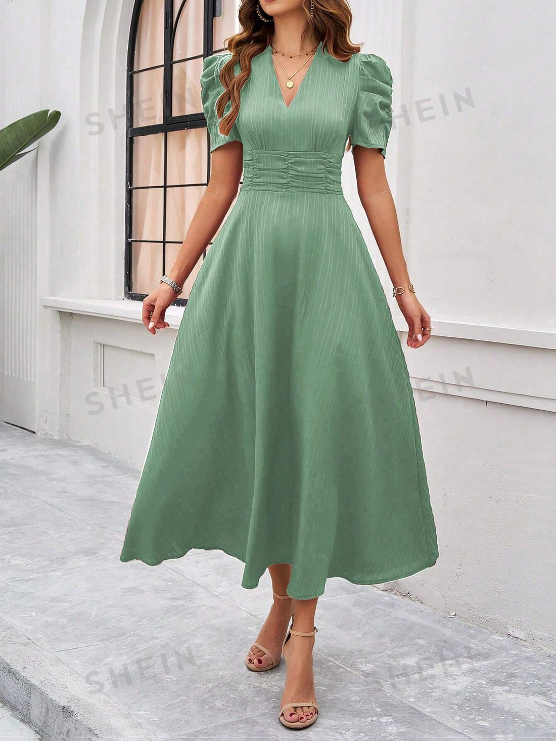 Flirty and feminine, this <a href="https://canaryhouze.com/collections/women-dresses" target="_blank" rel="noopener">dress</a> features puff sleeves and a waist-cinched silhouette for a flattering and stylish look. Perfect for any occasion, this dress will make you feel confident and fashionable. Made with high-quality materials for long-lasting wear.