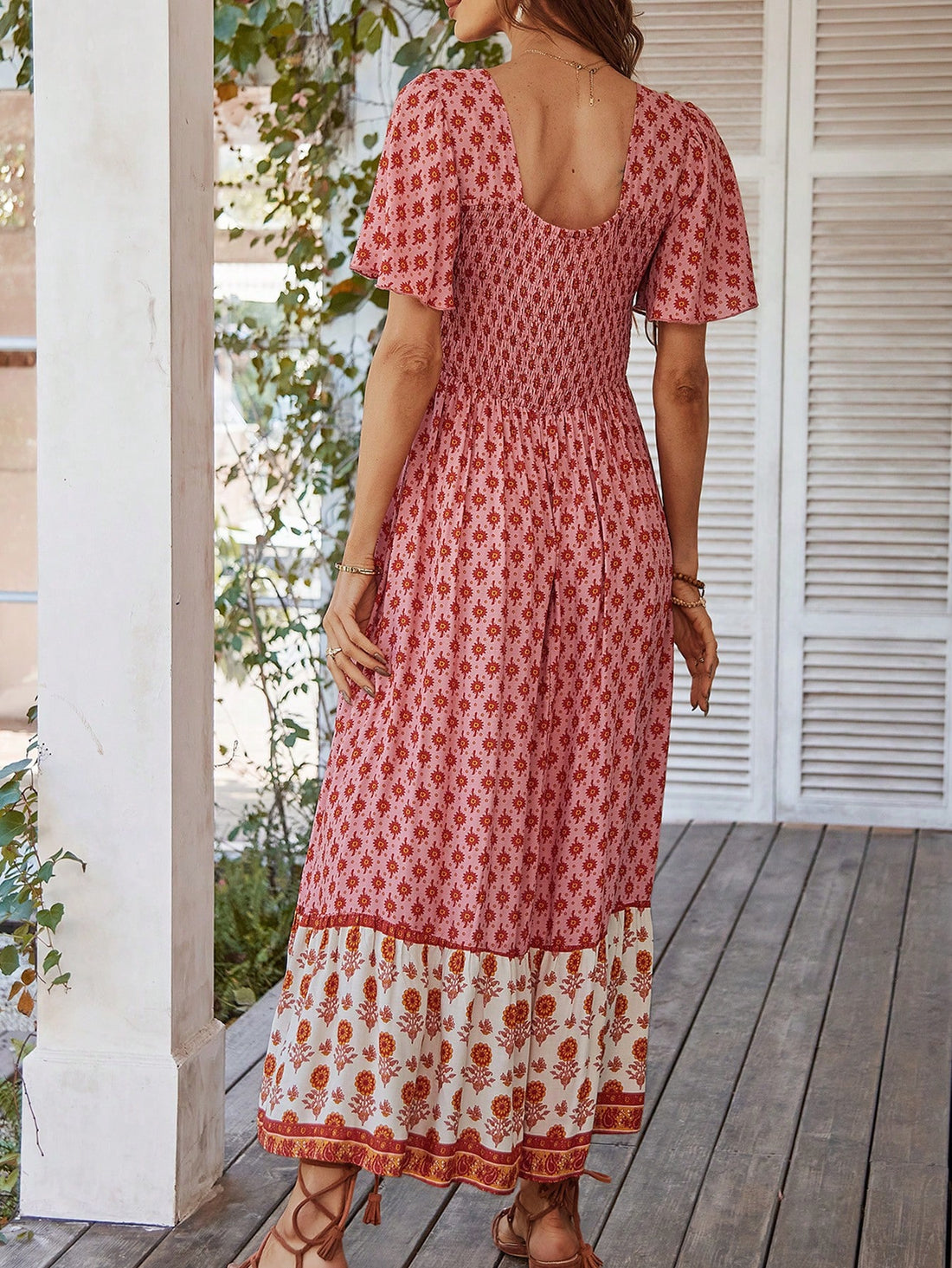Effortlessly embody bohemian chic with our Printed Patchwork Square Neck Long Dress. Made with a flattering square neckline and intricate patchwork design, this dress is perfect for any occasion. The flowing fabric drapes beautifully for a comfortable and stylish look. Upgrade your wardrobe with this must-have dress.
