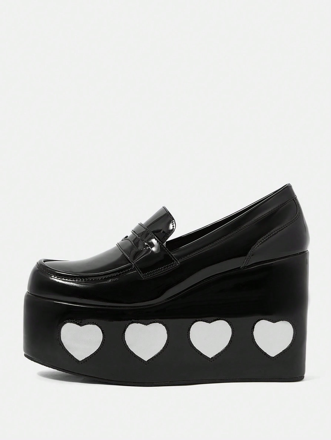 Elevate your style and comfort with our Heart Print Wedge Slip-Ons. Designed for the great outdoors, these shoes feature a heart print design and a comfortable wedge heel for added support. Stay both stylish and comfortable on your next adventure.