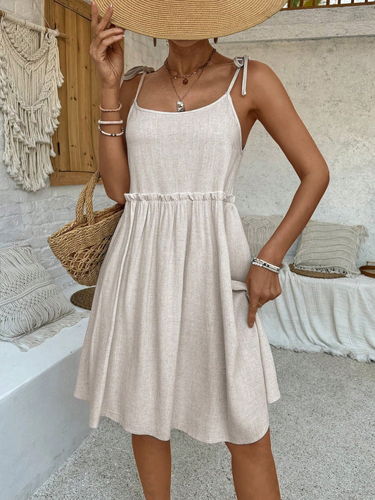 Elevate your summer style with our Shoulder Tie Cami Dress. Designed for those who love to feel the summer vibes, this dress features delicate shoulder ties and a breezy silhouette. Perfect for any occasion, this dress effortlessly combines comfort and style.