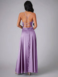 Back view of lilac gown showing crossed lace-up straps and open back