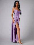 Three-quarter view of lilac satin dress highlighting side slit and flowing skirt