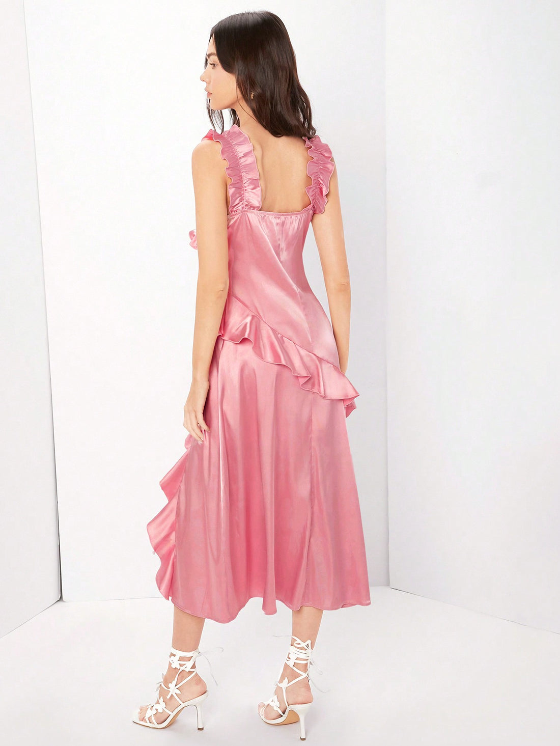 Unleash your inner charm with Chic Enchantment's Ruffle Trim Cami Dress! This stylish and playful dress features delicate ruffle trim and a charming bow detail, making it a must-have for any fashion-forward woman. Perfect for any occasion, this dress is sure to turn heads and make you feel confident and enchanting!