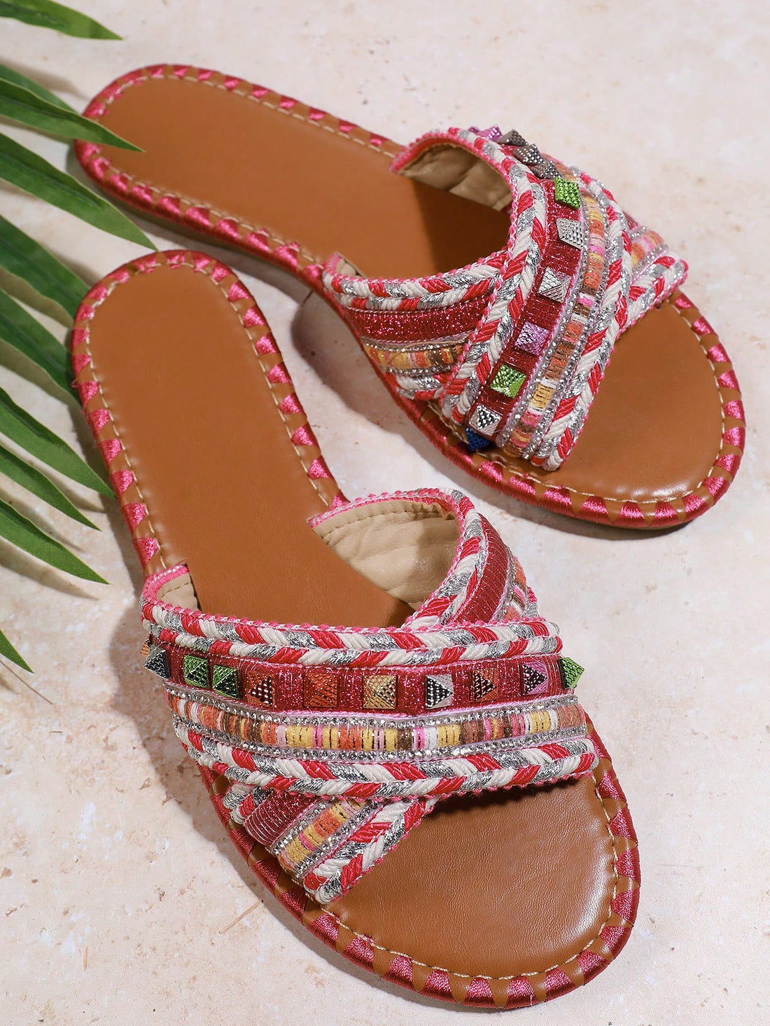 Elevate your style game with our Multicolored Rivet Bliss sandals. These stylish flats are designed for fashionable ladies who want to make a statement. With its unique multicolored rivet design, you'll stand out from the crowd. Get comfort and style all in one with our must-have sandals.