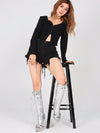 Punk Chic: Studded Knee-High Stiletto Boots with Tassel Detail