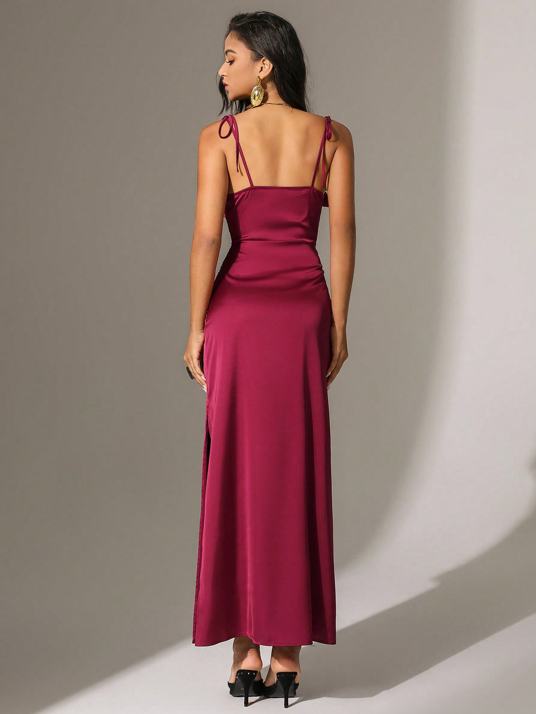 Upgrade your wardrobe with the Chic Anewsta Dress. Featuring spaghetti straps, a notched collar, and side slits, this dress is both stylish and playful. Perfect for any occasion, show off your unique style and personality with this quirky and fun dress.