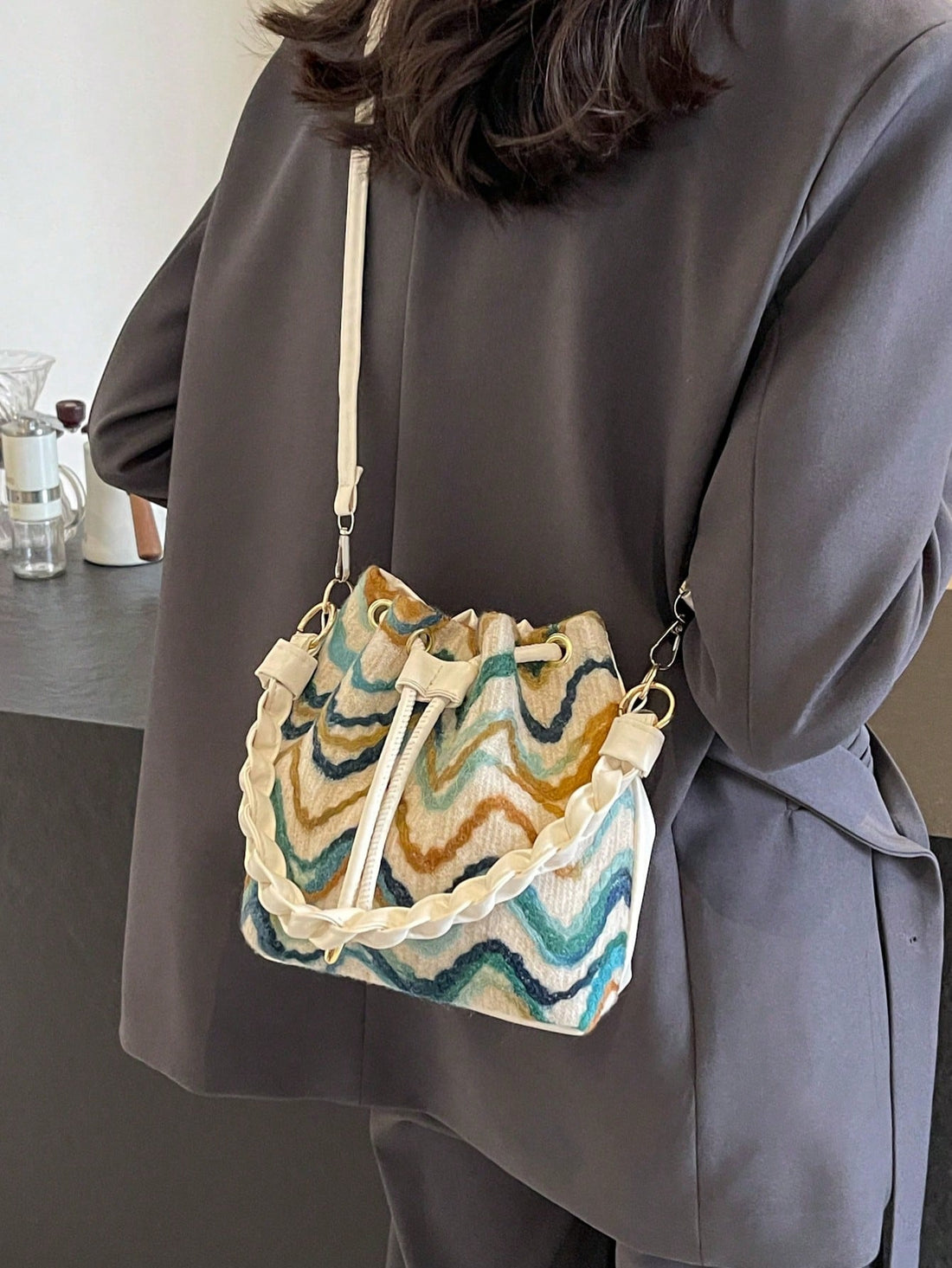 Elevate your style with our Luxury Woven Bucket Bag - the ultimate shoulder crossbody accessory. Expertly crafted with a timeless design, this bag is perfect for any occasion. Enjoy the convenience of a spacious interior and adjustable straps for versatile wear. A must-have for any fashionista.