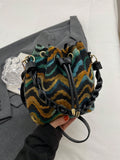 This Chic Women's Woven Bucket Bag features a high-end texture and versatile single shoulder crossbody style. Elevate your look with this stylish and functional bag that offers both fashion and convenience. Expertly crafted for the modern woman.