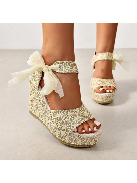 Elevate your style with these stunning lace bowknot wedge heel sandals! Designed for plus size women, these sandals provide a comfortable and secure fit while adding a touch of elegance to any outfit. With a versatile design, these sandals are perfect for any occasion.