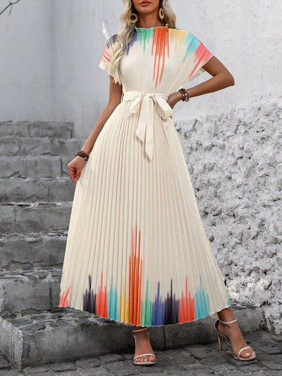 Elevate your style with our chic and stylish gradient color batwing sleeve pleated <a href="https://canaryhouze.com/collections/women-dresses" target="_blank" rel="noopener">dress</a>. Designed with a flattering silhouette and trendy batwing sleeves, this dress is perfect for any occasion. The pleated design adds texture and dimension while the gradient color gives a unique touch.