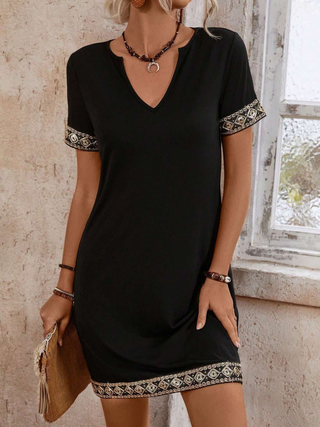 Add some sparkle to your wardrobe with our Chic Glitter Geometric Notched Collar Dress! The unique ribbon splicing adds a touch of playfulness to this glamorous piece. Perfect for a night out or special occasion, this dress will make you stand out in the best way possible. Shine on, fashionista!