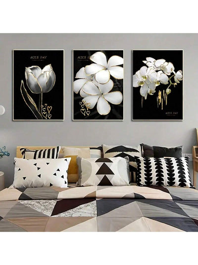Create a stylish and modern atmosphere in your home or hotel with our 3-piece floral canvas painting set. Featuring a black and white design, this set will add a touch of elegance to any room. Perfect for wall decor, this set is a must-have for those looking to elevate their interior design.