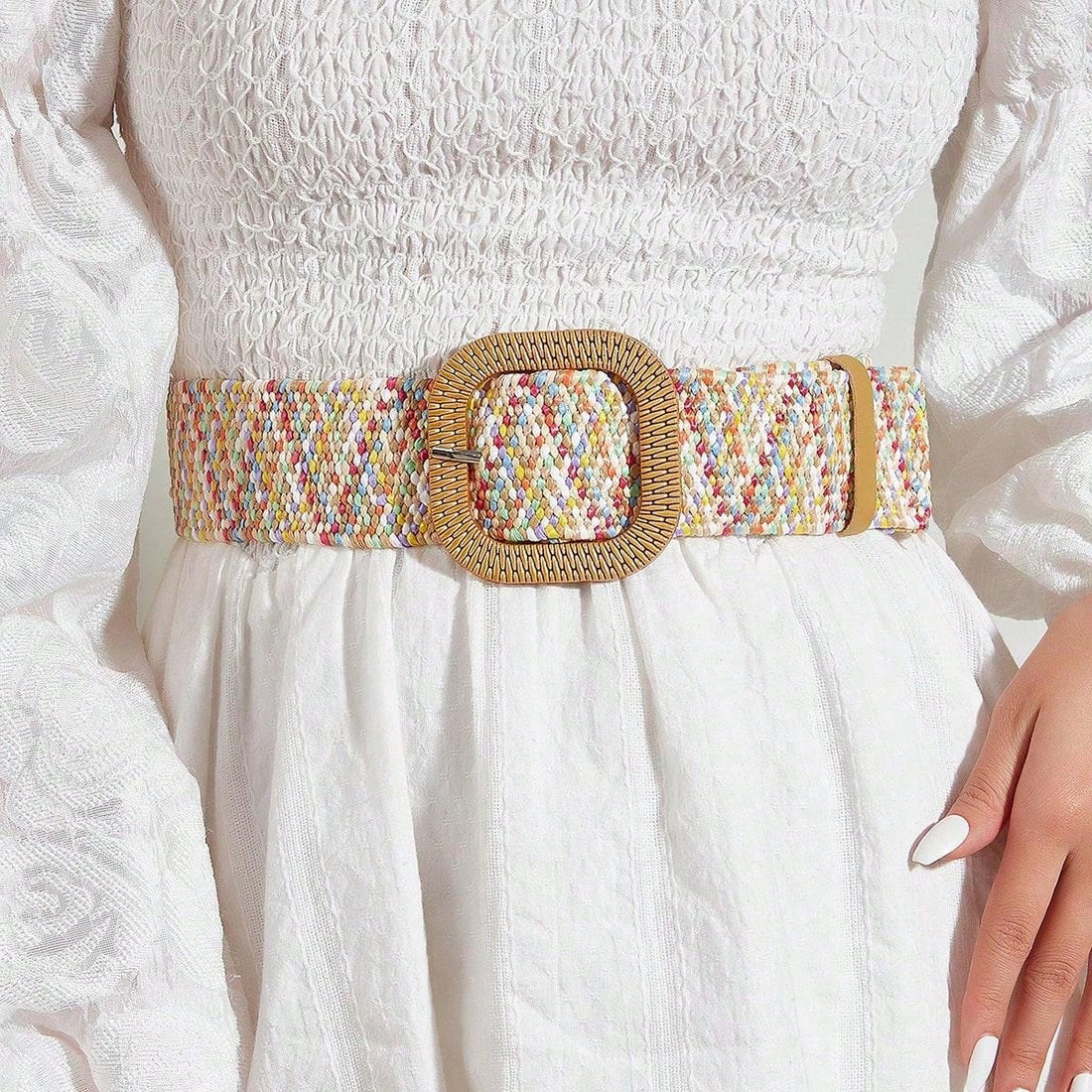 Elevate your holiday style with our Boho Chic Square Buckle Woven Belt. The intricate woven design and stylish square buckle add a touch of bohemian flair to any outfit. Perfect for adding a unique and trendy touch to your seasonal looks.