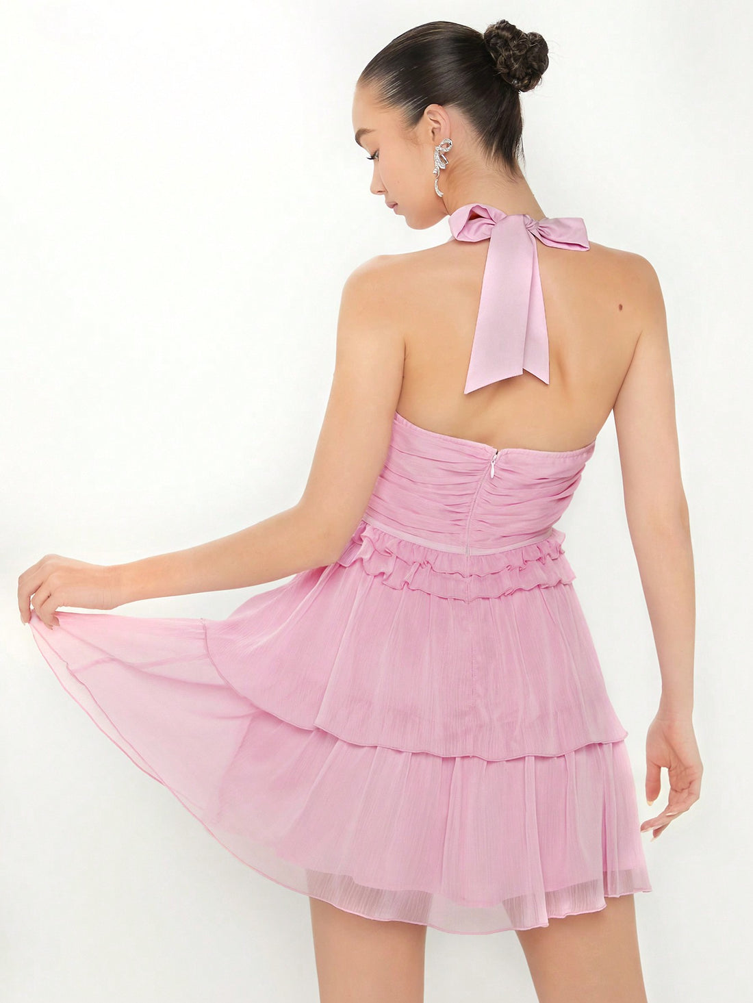 Flaunt your unique style with our Chic Enchantment Dress! This patchwork mesh dress features a playful ruffle-hem and a flattering halter neck design. Be the envy of all your friends with this quirky and chic dress.