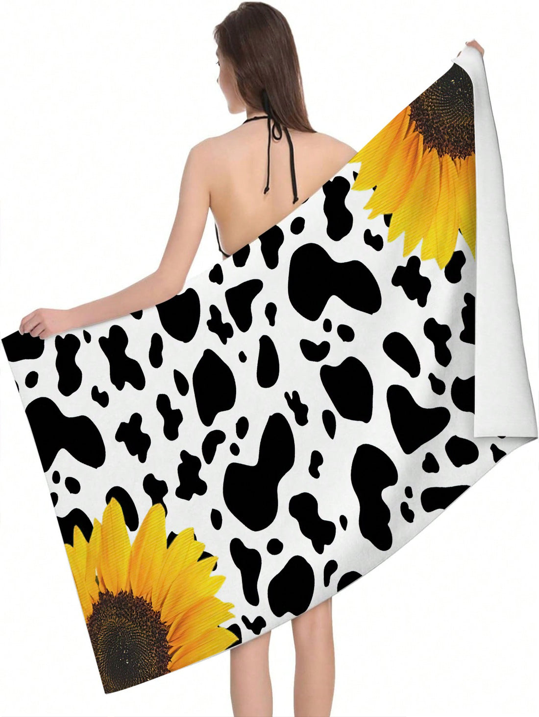 Upgrade your beach game with our Sunflower Cow Print Microfiber <a href="https://canaryhouze.com/collections/towels" target="_blank" rel="noopener">Beach Towel</a>! Made from super absorbent microfiber, it's the perfect companion for all your summer adventures. The vibrant sunflower and cow print adds a fun touch while the soft material is gentle on your skin. A must-have for any beach lover.