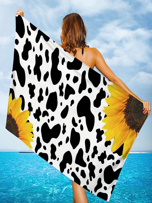 Upgrade your beach game with our Sunflower Cow Print Microfiber <a href="https://canaryhouze.com/collections/towels" target="_blank" rel="noopener">Beach Towel</a>! Made from super absorbent microfiber, it's the perfect companion for all your summer adventures. The vibrant sunflower and cow print adds a fun touch while the soft material is gentle on your skin. A must-have for any beach lover.
