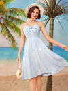 Elevate your vacation wardrobe with our Vintage Vacation Chic: Blue Halter Neckline Umbrella Skirt Dress. This stunning dress features a unique halter neckline and a flowy umbrella skirt that will surely turn heads. Its vintage design adds a touch of elegance while keeping you comfortable and stylish. Perfect for any sunny getaway.